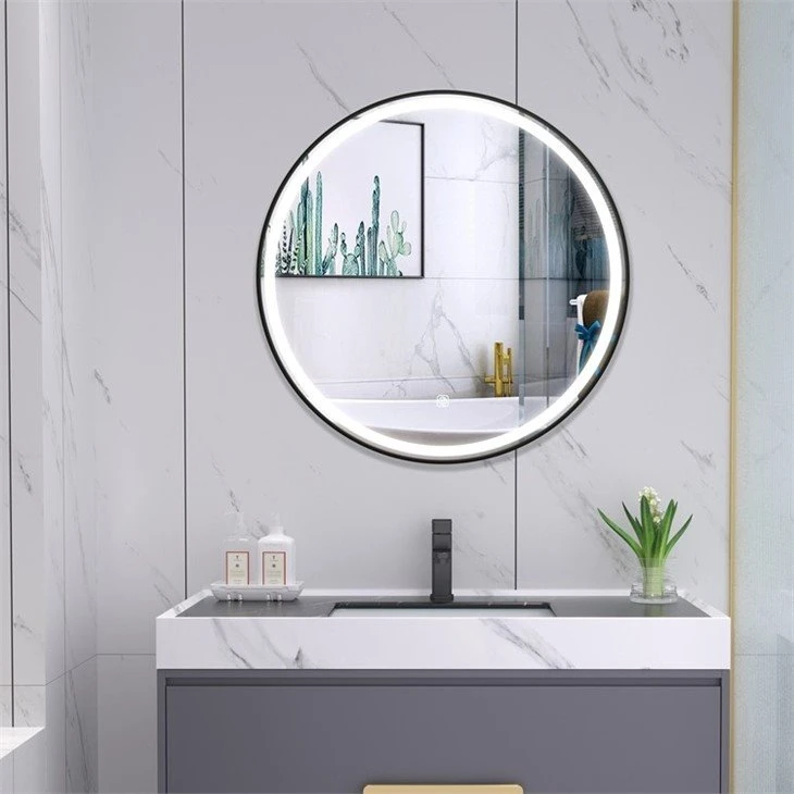 round mirror with light behind round mirror with light behind